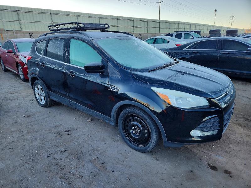 Photo 4 from auction – 2016 FORD ESCAPE SE with VIN 1FMCU9G92GUA98621