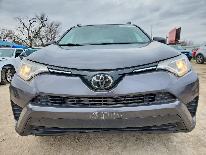 Photo 5 from auction – 2018 TOYOTA RAV4 LE with VIN 2T3ZFREV5JW418033