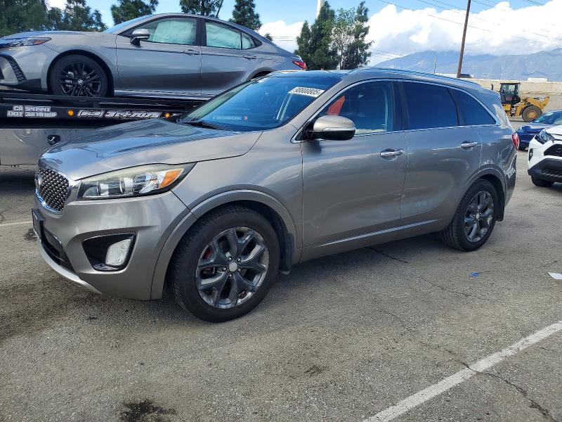 KIA SORENTO 2016 with VIN 5XYPK4A5XGG071060 - Photo from auction