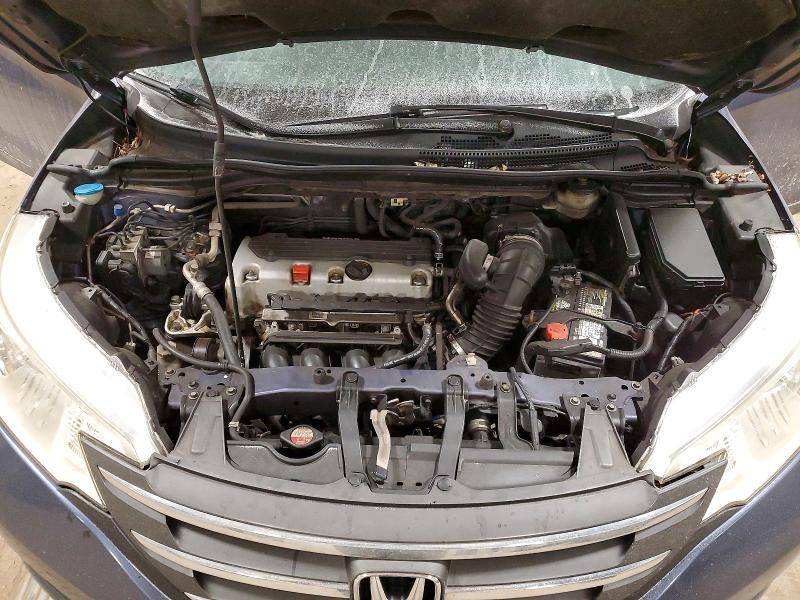 Photo 12 from auction – 2013 HONDA CR-V with VIN 3CZRM3H30DG702438
