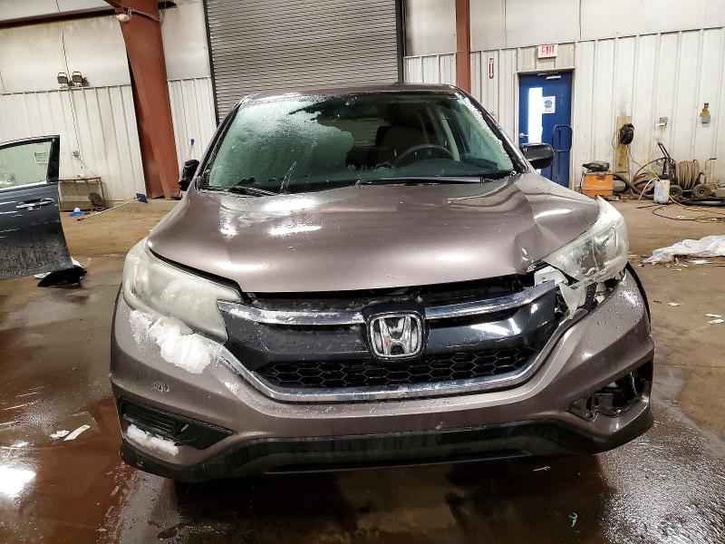 Photo 5 from auction – 2016 HONDA CR-V SE with VIN 5J6RM4H4XGL123155