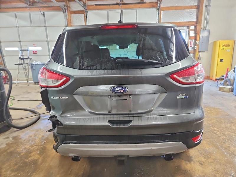 Photo 6 from auction – 2016 FORD ESCAPE SE with VIN 1FMCU9GX3GUB20852