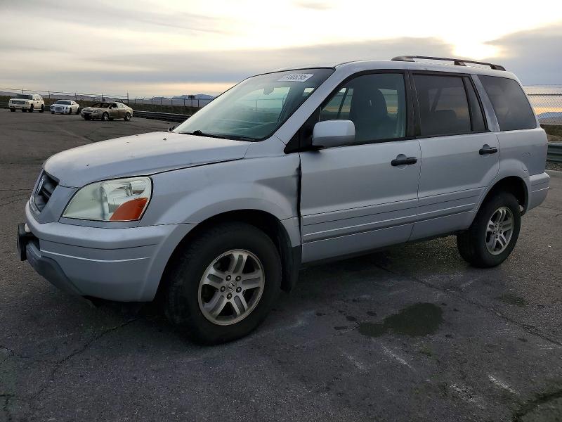 HONDA PILOT EX 2004 with VIN 2HKYF18434H519390 - Photo from auction