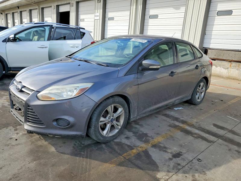 FORD FOCUS SE 2014 with VIN 1FADP3F2XEL329453 - Photo from auction