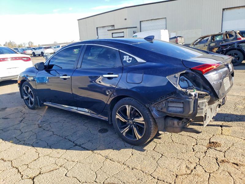 Photo 2 from auction – 2016 HONDA CIVIC TOUR with VIN 19XFC1F95GE216683