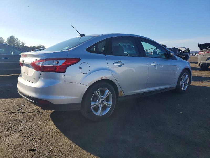 Photo 3 from auction – 2013 FORD FOCUS SE with VIN 1FADP3F23DL360042
