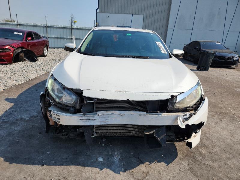 Photo 5 from auction – 2018 HONDA CIVIC EX with VIN 19XFC2F77JE040036