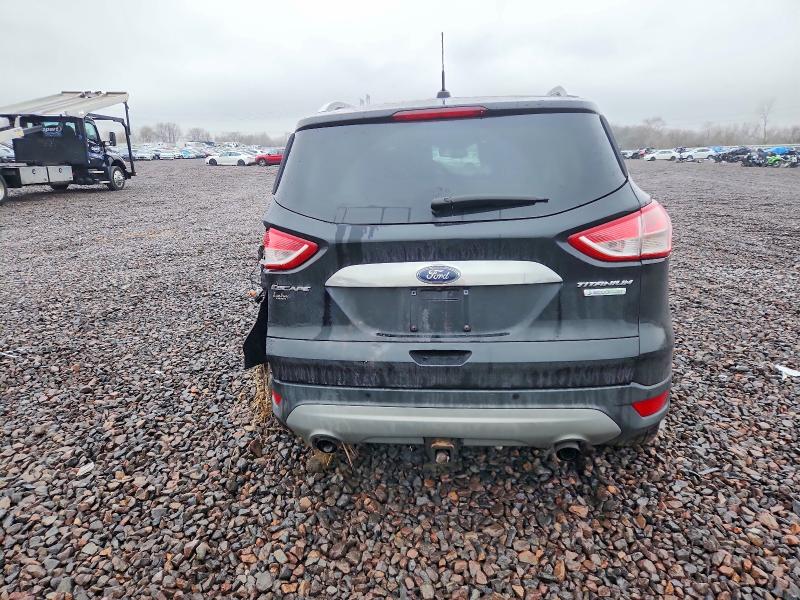 Photo 6 from auction – 2016 FORD ESCAPE with VIN 1FMCU0J98GUA66826