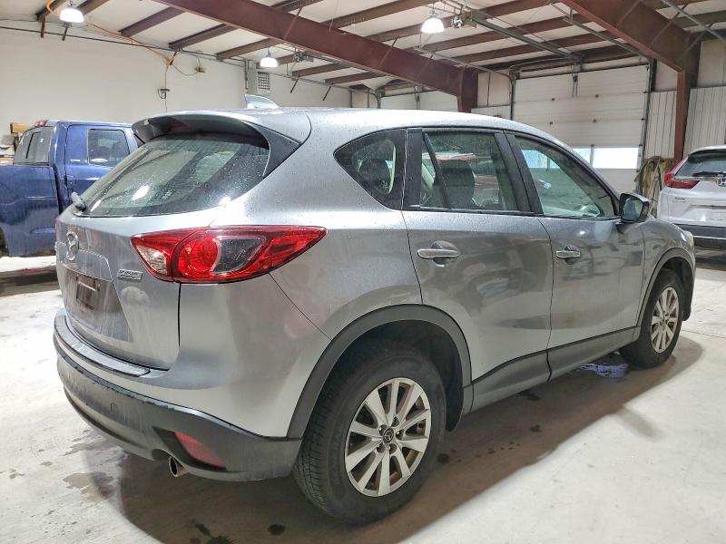 Photo 3 from auction – 2014 MAZDA CX-5 SPORT with VIN JM3KE2BE8E0404340