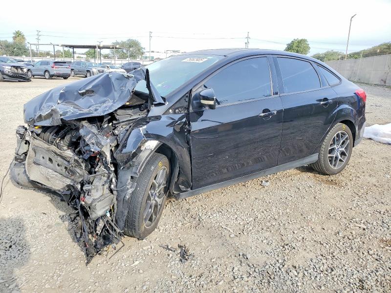 FORD FOCUS SEL 2018 with VIN 1FADP3H22JL312959 - Photo from auction
