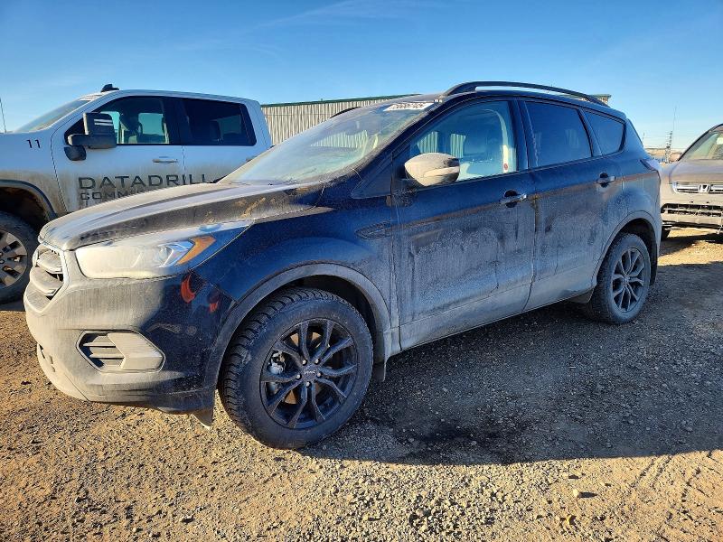 FORD ESCAPE TIT 2017 with VIN 1FMCU9J97HUB70200 - Photo from auction