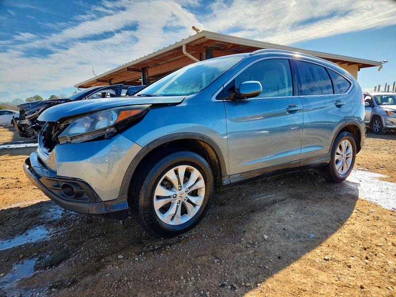 HONDA CR-V EXL 2014 with VIN 2HKRM4H76EH693137 - Photo from auction