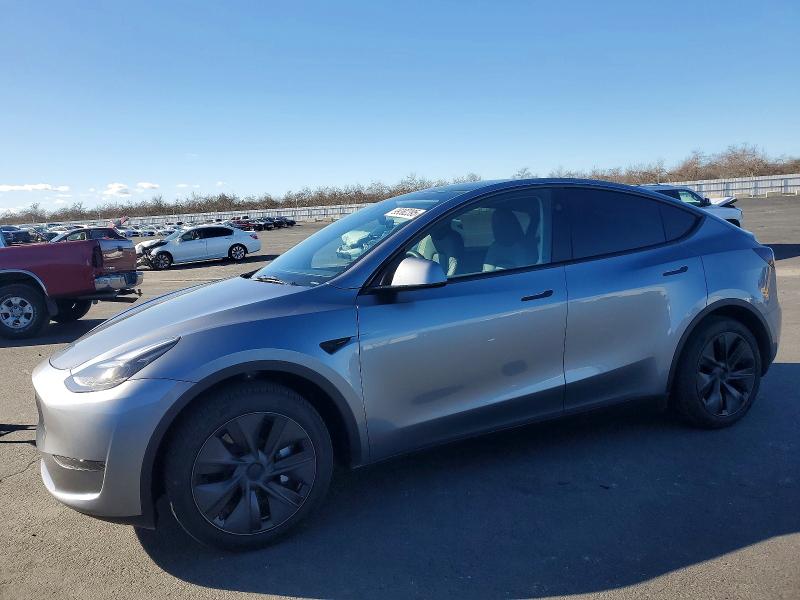 TESLA MODEL Y 2025 with VIN 7SAYGDED8SA367850 - Photo from auction