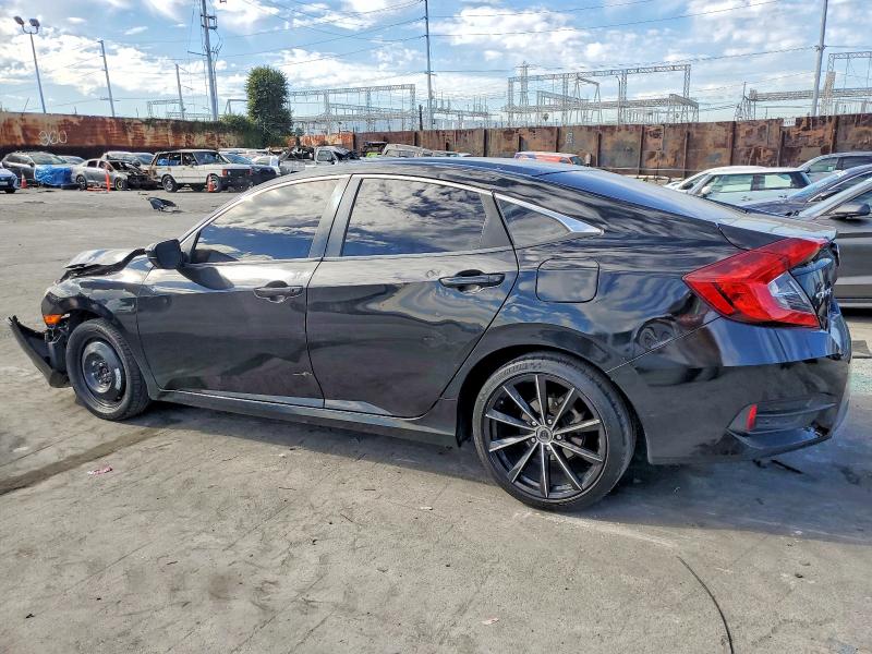 Photo 2 from auction – 2017 HONDA CIVIC LX with VIN 2HGFC2F51HH558027