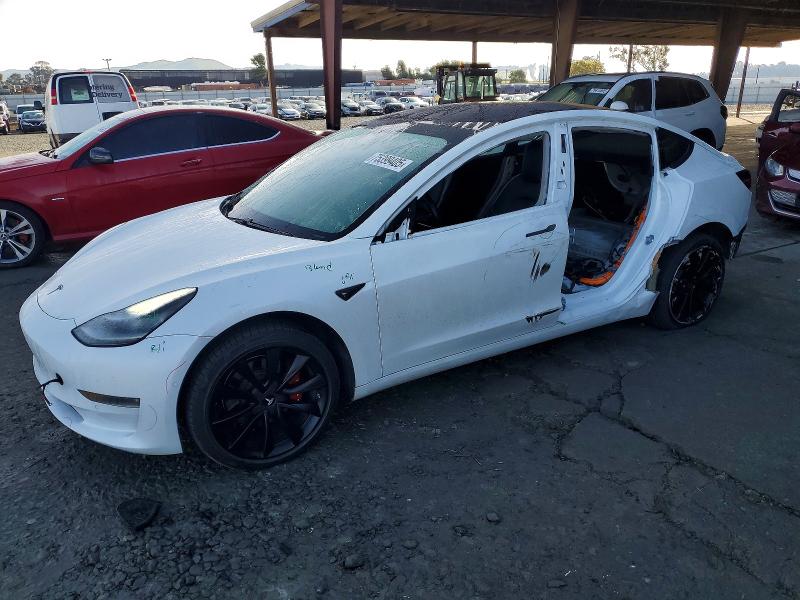 TESLA MODEL 3 2018 with VIN 5YJ3E1EA9JF006517 - Photo from auction