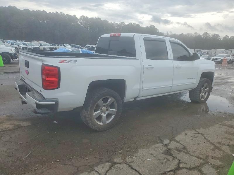 Photo 3 from auction – 2017 CHEVROLET SILVERADO with VIN 3GCUKREC6HG466560