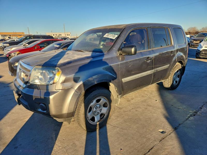 HONDA PILOT LX 2011 with VIN 5FNYF3H21BB005026 - Photo from auction