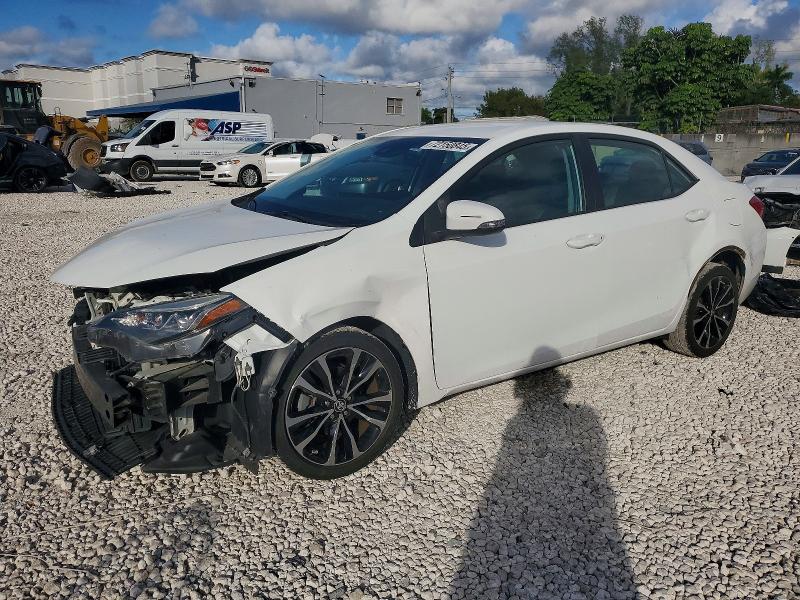 TOYOTA COROLLA L 2018 with VIN 5YFBURHE0JP765170 - Photo from auction