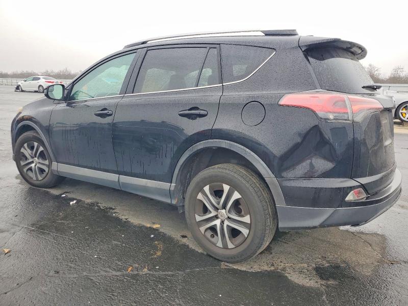 Photo 2 from auction – 2016 TOYOTA RAV4 with VIN 2T3ZFREV7GW300428