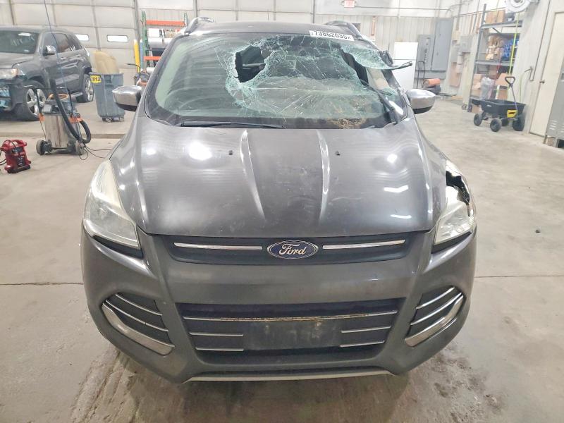Photo 5 from auction – 2015 FORD ESCAPE with VIN 1FMCU9GX0FUC77723