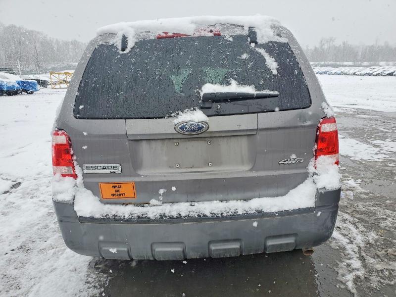 Photo 6 from auction – 2009 FORD ESCAPE with VIN 1FMCU93779KC21168