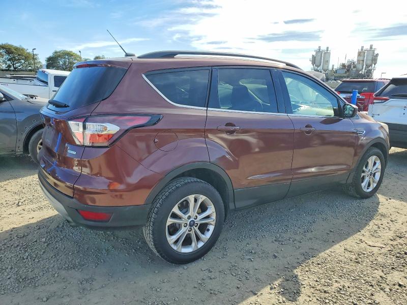 Photo 3 from auction – 2018 FORD ESCAPE SE with VIN 1FMCU0GD2JUA04695