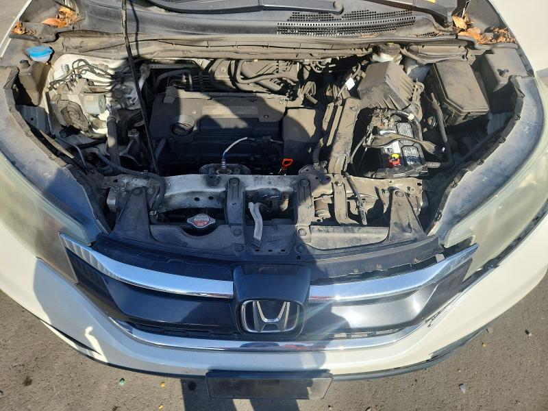 Photo 12 from auction – 2015 HONDA CR-V LX with VIN 5J6RM3H35FL022976
