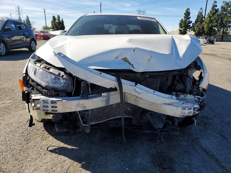Photo 5 from auction – 2018 HONDA CIVIC EX with VIN 19XFC2F70JE208499