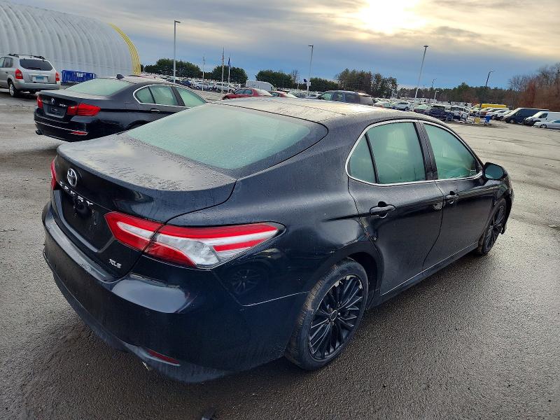 Photo 3 from auction – 2018 TOYOTA CAMRY L with VIN 4T1B11HKXJU106950
