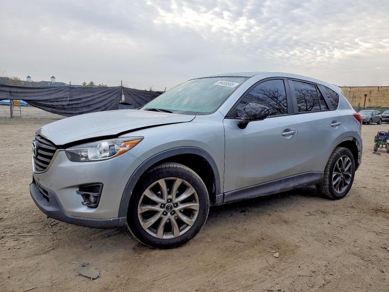 MAZDA CX-5 GT 2016 with VIN JM3KE4DYXG0897069 - Photo from auction