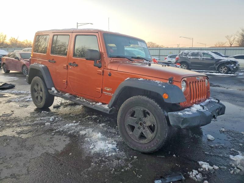 Photo 4 from auction – 2011 JEEP WRANGLER U with VIN 1J4HA5H1XBL572649