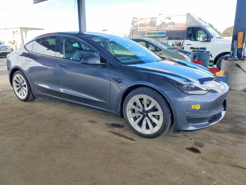 Photo 4 from auction – 2022 TESLA MODEL 3 with VIN 5YJ3E1EB9NF250389