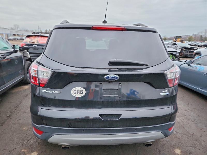 Photo 6 from auction – 2017 FORD ESCAPE SE with VIN 1FMCU9GD2HUA05487