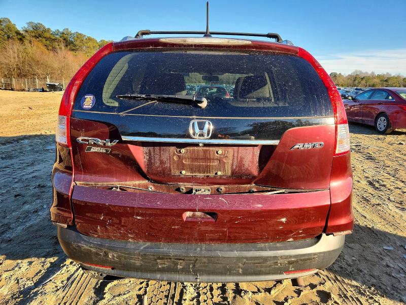 Photo 6 from auction – 2014 HONDA CR-V with VIN 5J6RM4H79EL043322