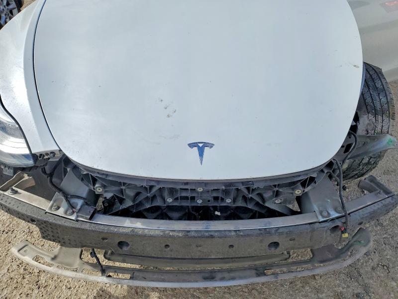 Photo 11 from auction – 2023 TESLA MODEL Y with VIN 7SAYGDEE4PA088444