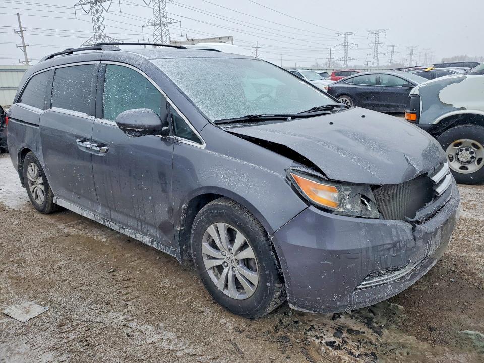 Photo 4 from auction – 2015 HONDA ODYSSEY with VIN 5FNRL5H64FB101248