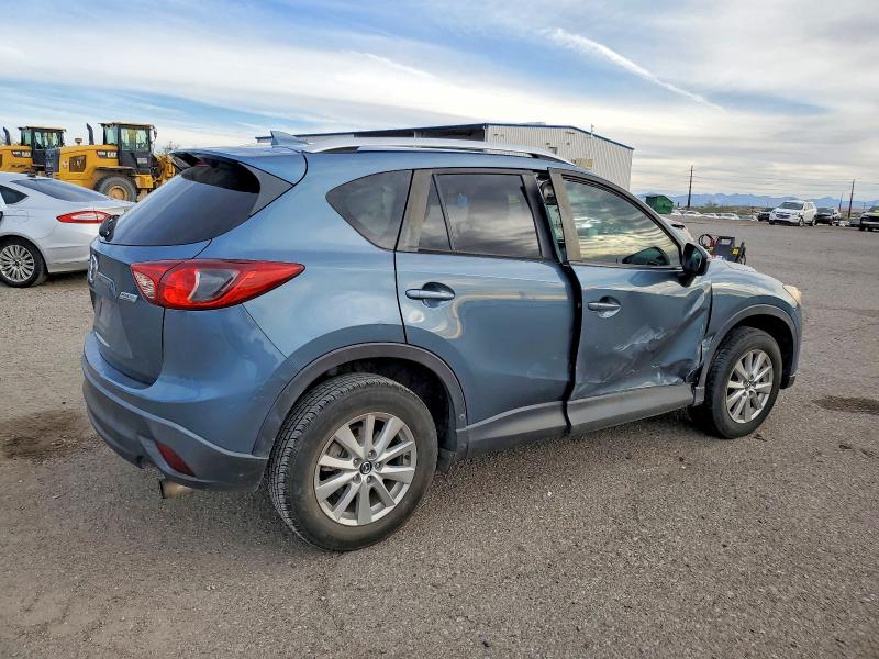Photo 3 from auction – 2016 MAZDA CX-5 TOURI with VIN JM3KE2CY8G0690590