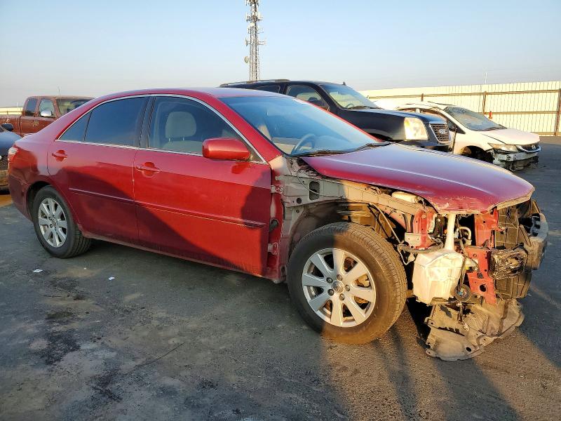 Photo 4 from auction – 2007 TOYOTA CAMRY HYBR with VIN JTNBB46K573036239
