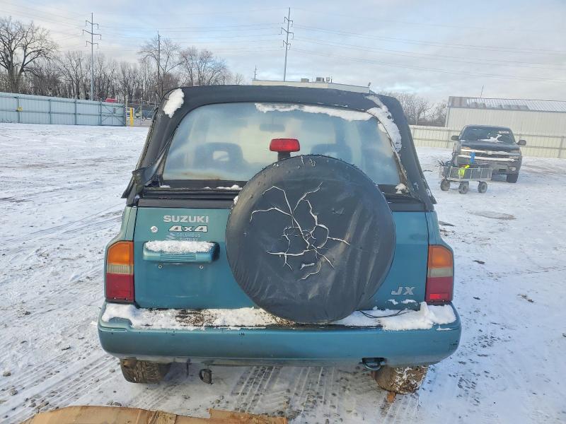 Photo 6 from auction – 1997 SUZUKI SIDEKICK J with VIN 2S3TA02C7V6408397