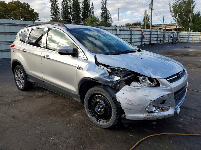 Photo 4 from auction – 2013 FORD ESCAPE with VIN 1FMCU9HX9DUC16947
