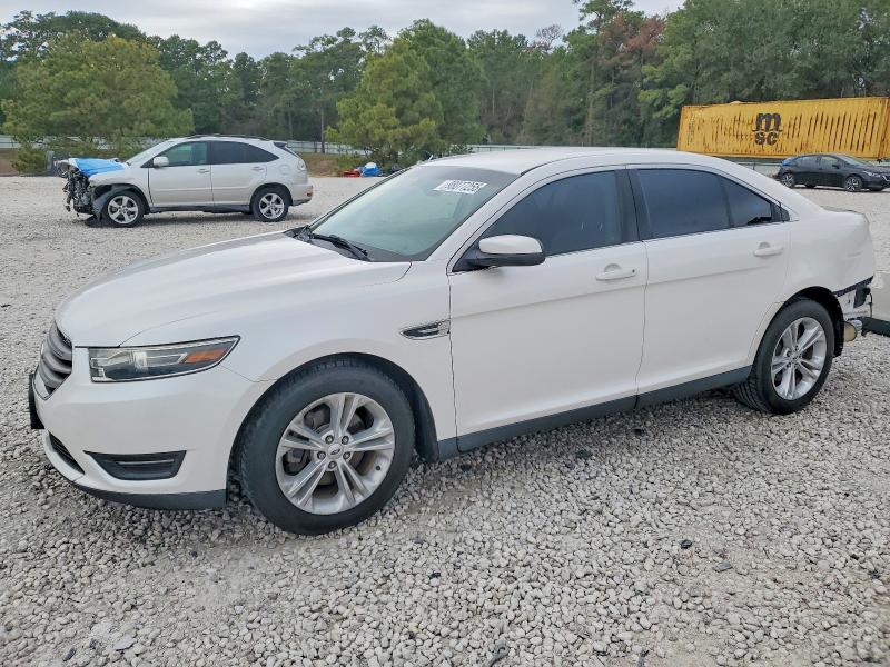 FORD TAURUS SEL 2015 with VIN 1FAHP2E89FG148534 - Photo from auction