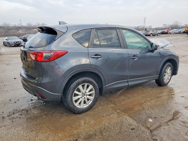 Photo 3 from auction – 2014 MAZDA CX-5 TOURI with VIN JM3KE2CY0E0335331