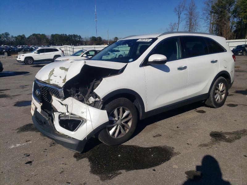 KIA SORENTO 2016 with VIN 5XYPG4A35GG006780 - Photo from auction