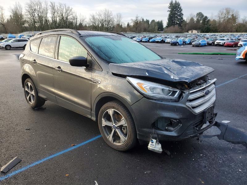 Photo 4 from auction – 2018 FORD ESCAPE with VIN 1FMCU9HD8JUB84493