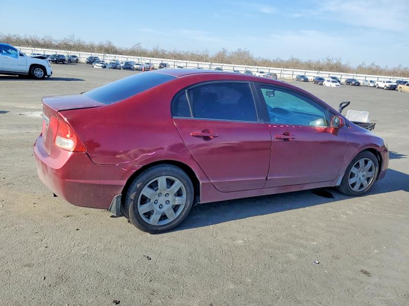Photo 3 from auction – 2010 HONDA CIVIC LX with VIN 2HGFA1F59AH520163