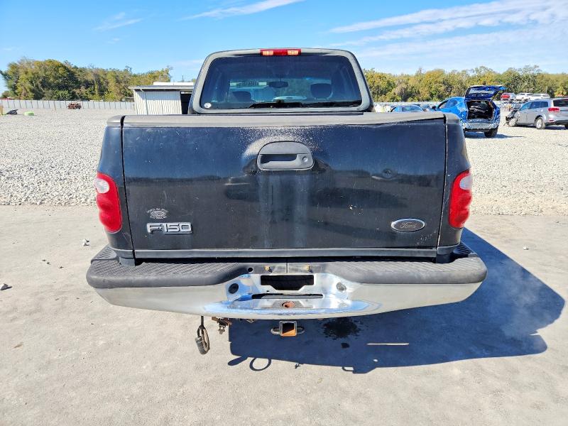 Photo 6 from auction – 2002 FORD F150 with VIN 1FTRX07WX2KB73853