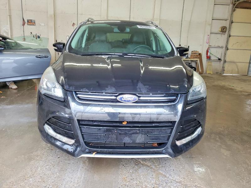 Photo 5 from auction – 2014 FORD ESCAPE TIT with VIN 1FMCU0J97EUD55872