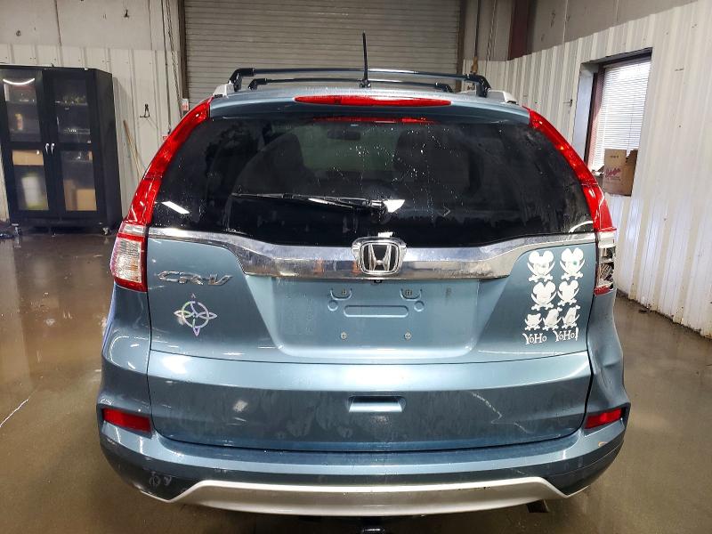 Photo 6 from auction – 2015 HONDA CR-V with VIN 2HKRM3H5XFH532641