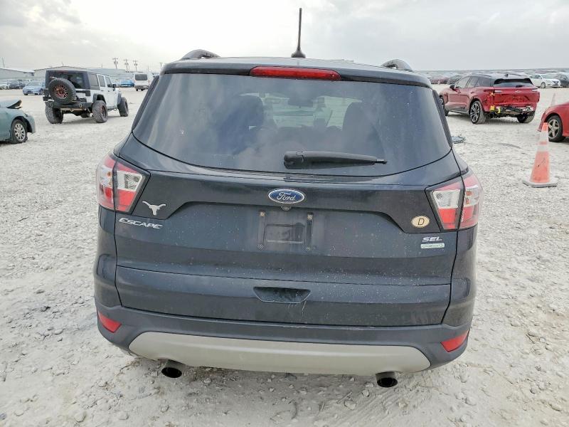 Photo 6 from auction – 2018 FORD ESCAPE SEL with VIN 1FMCU0HD1JUC31990