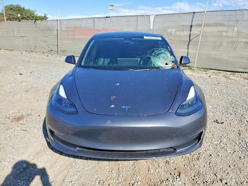 Photo 5 from auction – 2022 TESLA MODEL 3 with VIN 5YJ3E1EA3NF122852